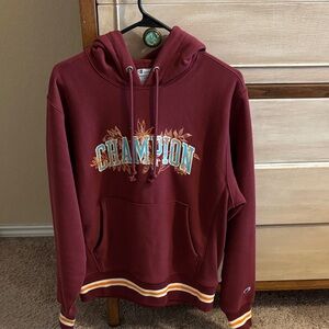 Champion Burgundy Hoodie with Embroidered Design